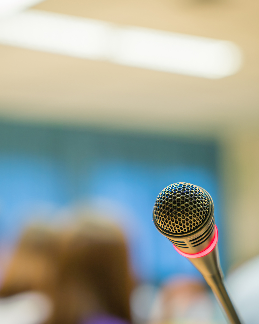 Black microphone in conference room